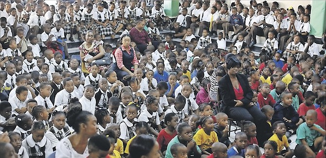 Students at CW Sawyer Primary School yesterday as they held a science day fair on the school grounds under the theme “Preserving Our Enviroment”. Photo: Terrel W. Carey/Tribune Staff