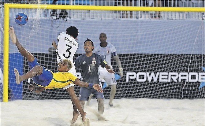A spectacular effort on goal from Brazil during their 9-3 victory over Japan yesterday, which ensured they topped Group D.
