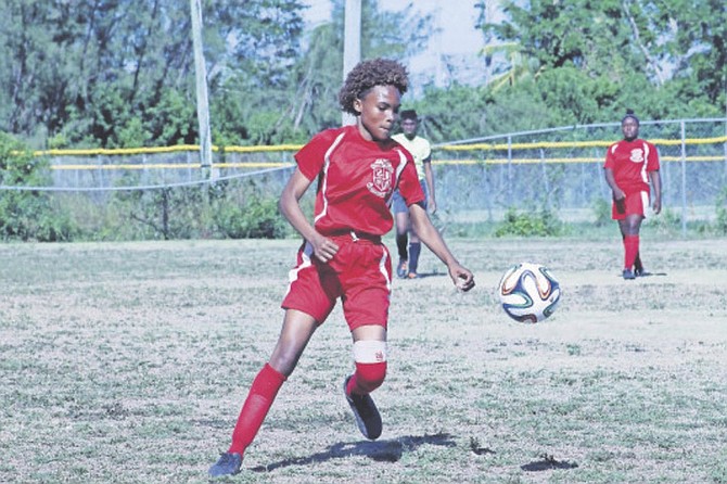 BALL CONTROL: The CV Bethel Lady Stingrays dethroned the defending champions CR Walker Lady Knights 2-1 in extra time on Monday afternoon.