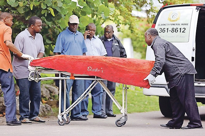 The body of the man removed from the scene on Friday. Photo: Terrel W Carey/Tribune staff