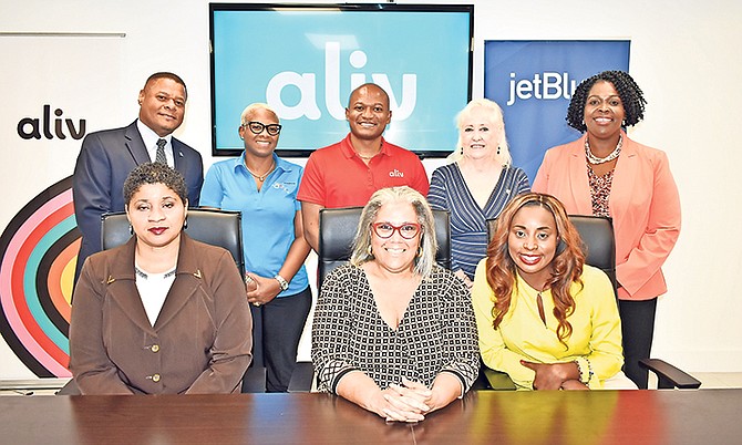 Committee members and sponsors in a group photo.
