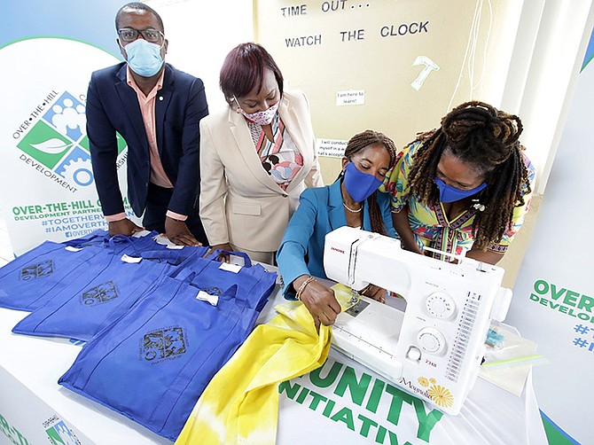 MRS PATRICIA MINNIS, wife of the prime minister, visits a sewing programme launched by the Over-the-Hill Community Development Partnership Initiative. Photo: Derek Smith/BIS