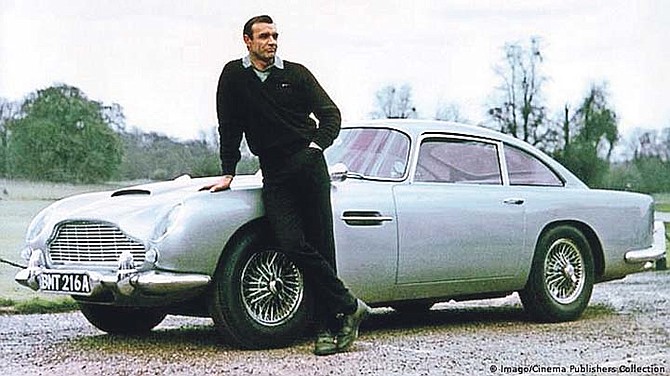 Sean Connery with the Aston Martin DB5 seen in Goldfinger.