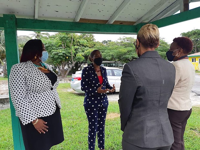 PATRICIA Minnis chats with the staff at the Willie Mae Pratt Centre for Girls.