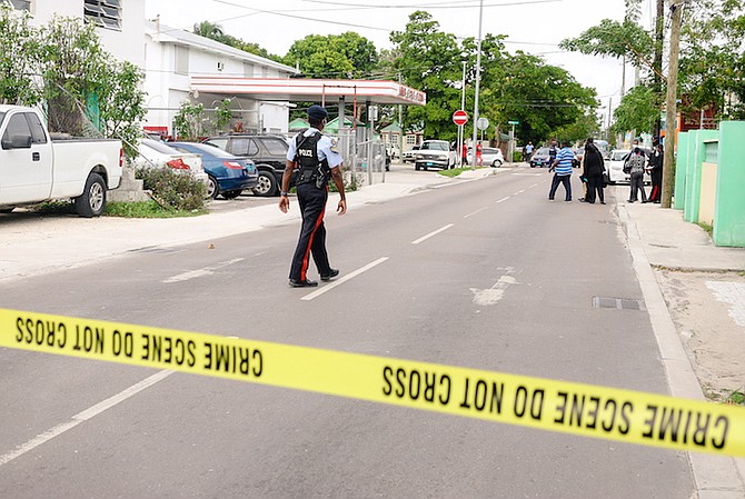 POLICE cordon off the scene of yesterday’s shooting. Photo: Donovan McIntosh