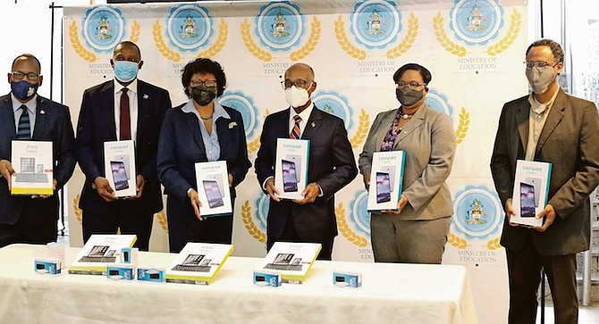 THE HANDOVER of tablets by the District Grand Lodge Bahamas and Turks and Caicos Islands and
the Bahamas Football Association. Photo: Donovan McIntosh