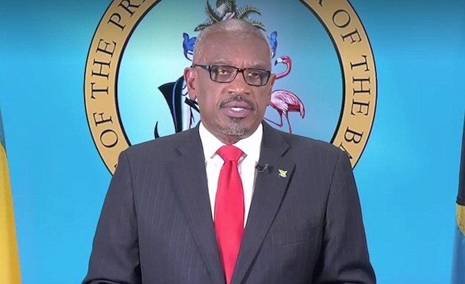 Prime Minister Dr Hubert Minnis speaks on Sunday night.