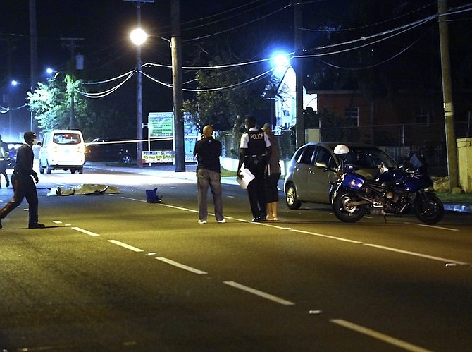 THE SCENE of the collision on Tuesday night, in which a motorcyclist was killed. Photo: Racardo Thomas/Tribune Staff