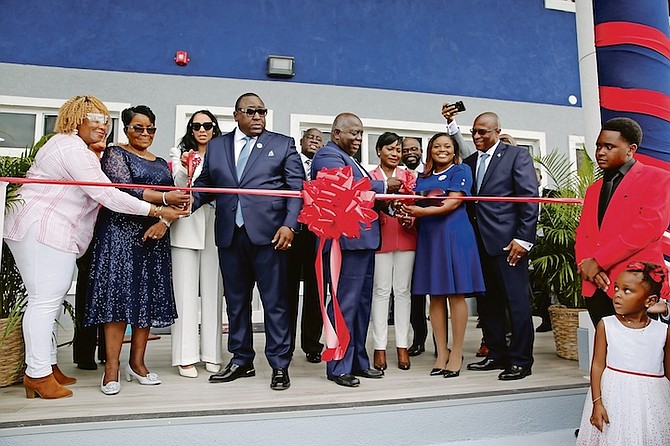 THE RIBBON is cut on the new $2m Elnet Maritime Centre yesterday. Photo: Andrew Miller/BIS