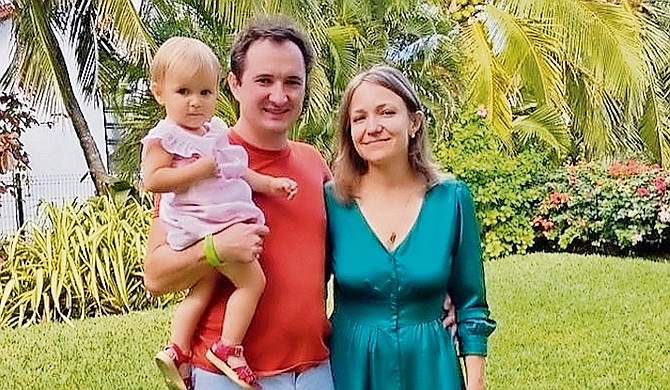 GALYNA GRYNKIV, her husband Sergii and their daughter Anna.