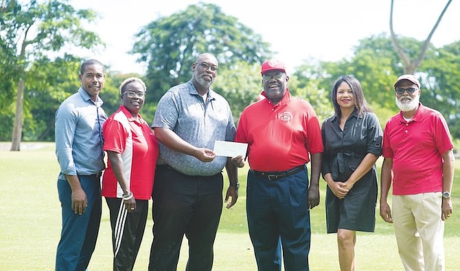 SHOWN, from left to right, are SAC Alumni member Osbourne Moxey, Daria Adderley, BGF junior development member Fred Taylor, Unca Lou Charity Golf committee chairman Michael Rolle, SAC Alumni Association president Cherelle Cartwright, and Geno Nairn, Unca Lou Charity Golf committee member. 
Photo: Moise Amisial