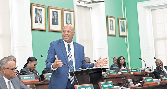 LABOUR and Immigration Minister Keith Bell in Parliament yesterday. Photo: Moise Amisial