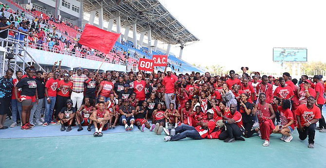St Augustine’s College Big Red Machine celebrate their victory. Photos: Austin Fernander