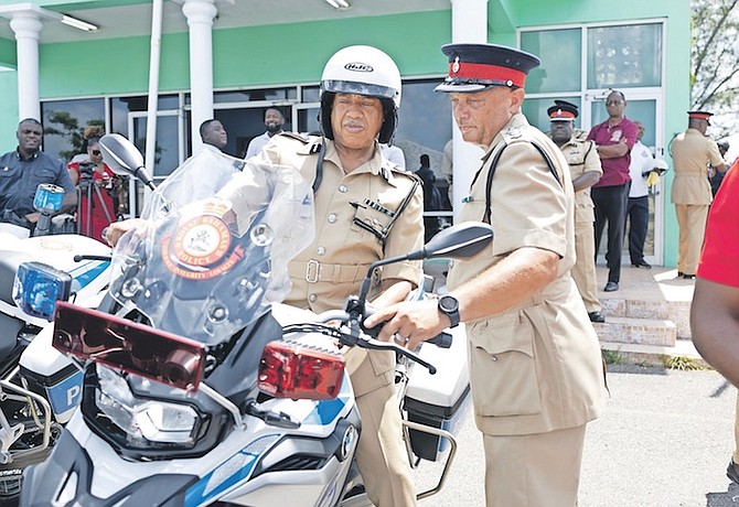 Commissioner of Police Clayton Fernander sits on one of the newly acquired BMW motorcycles.
Photo: Moise Amisial