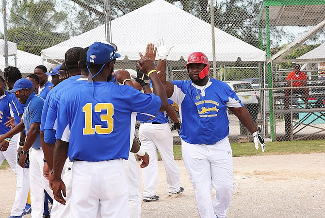 Grand Bahama Lucayans beat MICAL 14-0 in men’s softball play yesterday in Bankers’ Field at the Baillou Hills Sporting Complex. 
Photos by Patrick Hanna/BIS