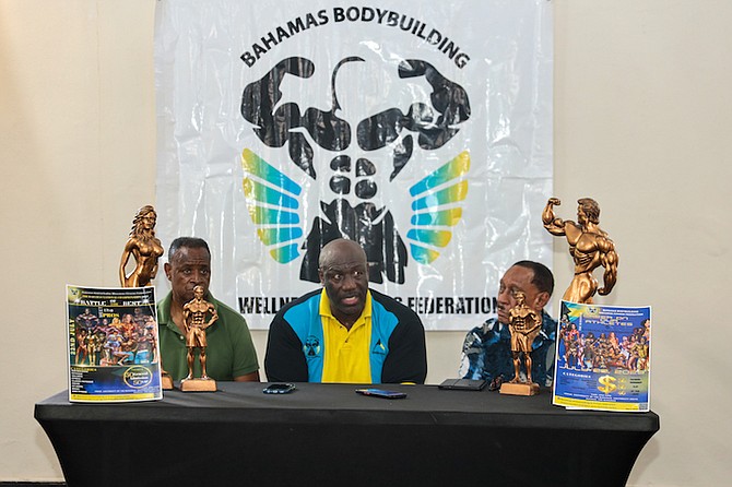 Danny Sumner, Joel Stubbs and Richard Demeritte talking about the Bahamas Bodybuilding Federation Nationals on Saturday.
Photo: Austin Fernander/Tribune Staff