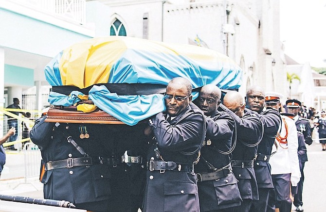 Royal Bahamas Police Officers carry the coffin of former Police Commissioner Paul Farquharson during his state funeral yesterday. His body is expected to be laid to rest at St Mary Magdalene Anglican Church Cemetery in Glinton’s, Long Island. 						    
 Photo: Moise Amisial