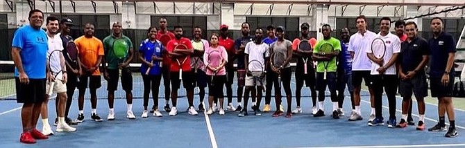 COACH Ricardo Demeritte and ITF Level 2 participants.