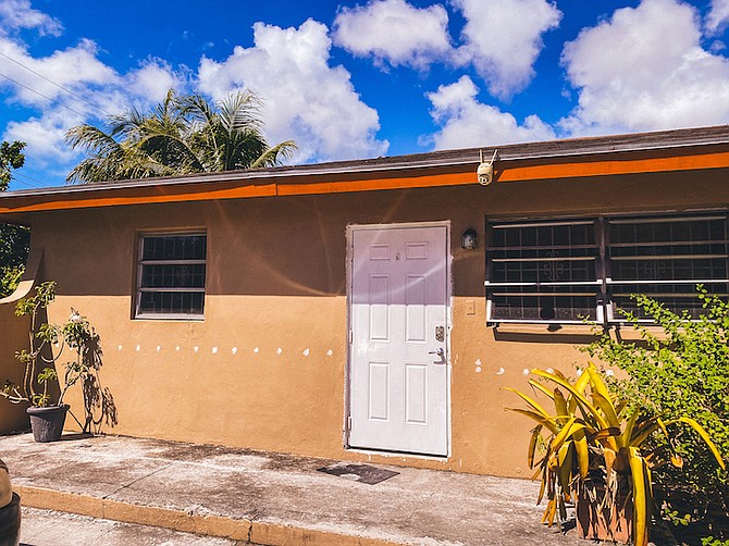 THE puzzling deaths of 22-month-old Anwar Miller and his father yesterday morning in an apartment complex on Family Street (pictured) have left many struggling to put the pieces together. 
Photos: Moise Amisial