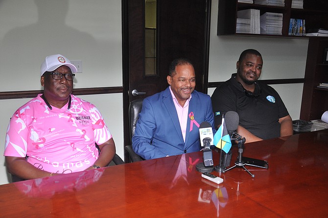 MINISTRY of Tourism official Nuvolari Chotoosingh (centre) announced plans for Oktoberfest in Freetown, East End, on October21. Clayton Russell, assistant general manager at Bahamian Brewery and Beverage Company (left), and Leyland Laing, of Freetown Festivals Committee (right) are partners with the MOTIA.
Photo: Vandyke Hepburn