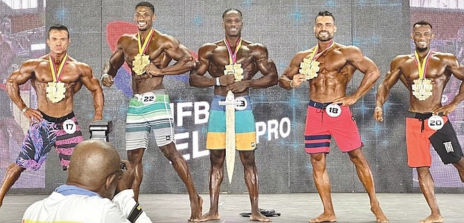 Kaif Young, second from left, and Jason ‘Shred’ Johnson, middle, can be seen on stage during the final placing.