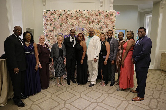 MEMBERS of the Rotary Club of Nassau pose for a photo during a Rotary gala event held at Rosewood,
Baha Mar on Saturday.
Photos: Dante Carrer