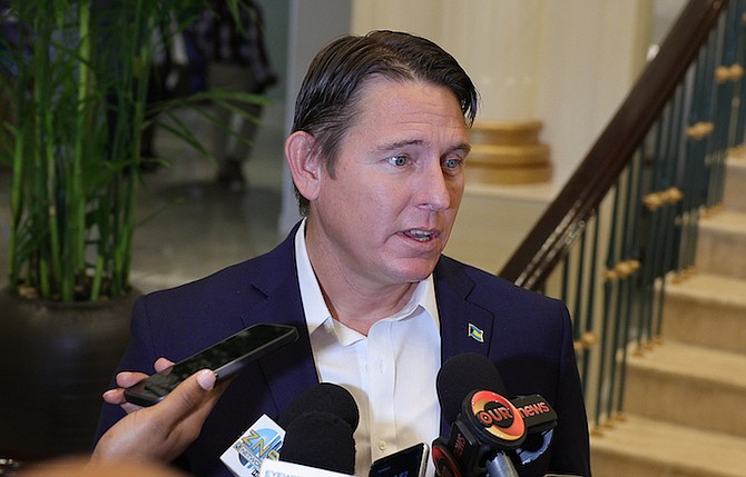 MINISTER for Central and South Abaco John Pinder II speaks to reporters after the opening ceremony
of the British Colonial yesterday.
Photo: Dante Carrer