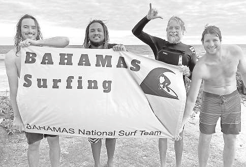 BAHAMAS ISA World Surfing Games team members Chris Al- bury (2nd from left), Joey Gale (far right) and Luke Prosa.