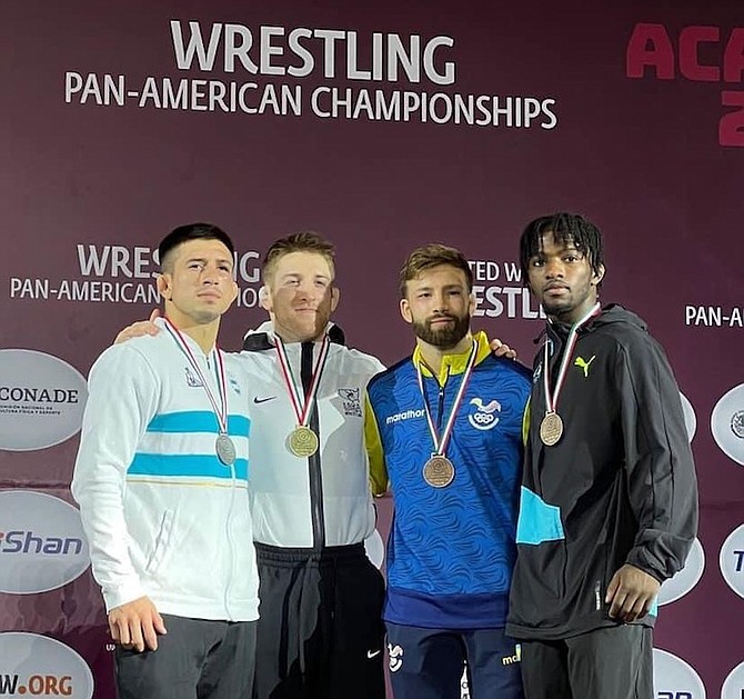 MAKING HISTORY: Shown, from left to right, are silver medallist Agustin Destribats of Argentina, gold medallist Nicholas Lee of the United States, second bronze medallist Jacob Alexander Torres of Canada and Bahamian Shannon Hanna.
Photo: United World Wrestling