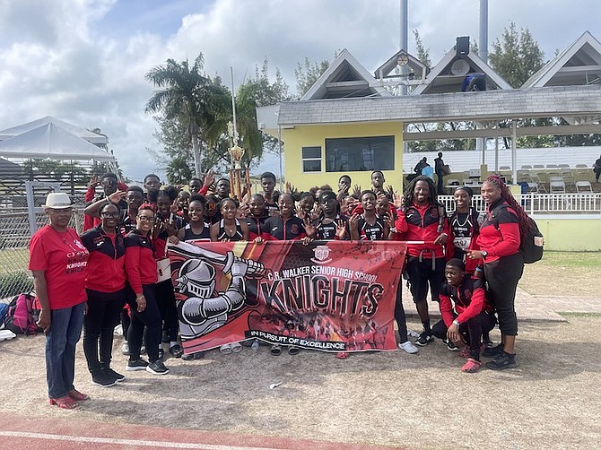 ALL FOR ONE: The CR Walker Knights pulled ahead on the final two days of the 30th GSSSA Track and Field Championships to win their seventh title in the competition.