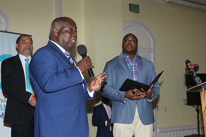 Prime Minister Philip "Brave" Davis speaking in Grand Bahama on Monday. 
Photo: Vandyke Hepburn