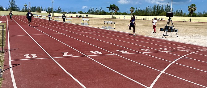 ON THE MOVE: Athletes displayed their talents on the track and field on Saturday at the Fritz Grant Track and Field Invitational hosted at the original Thomas A Robinson Stadium. Photo: Tenajh Sweeting