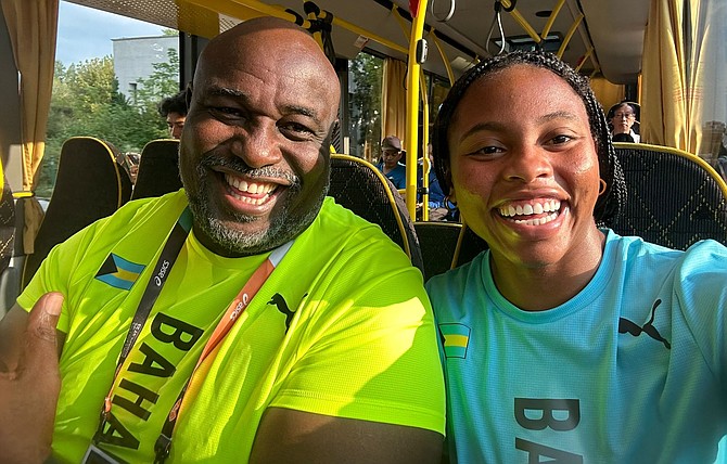 Javelin thrower Rhema Otabor with coach Corrington Maycock, right.