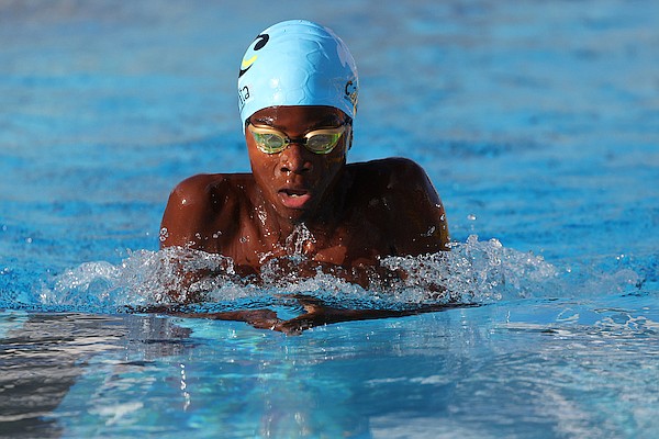 MAKING A SPLASH: Top swimmers compete during the Bahamas Aquatics’ 52nd Bahamas National Swimming Championships at the Betty Kelly Kenning Swim Complex. Photo: Dante Carrer/Tribune Staff