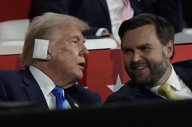 Donald Trump alongside his VP pick JD Vance