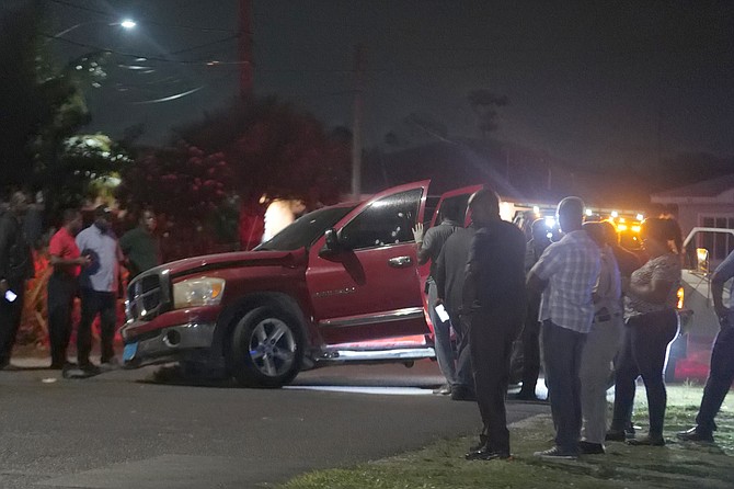 A red truck in which a man in his late 20s was shot dead on Saturday evening. Photo: Nikia Charlton