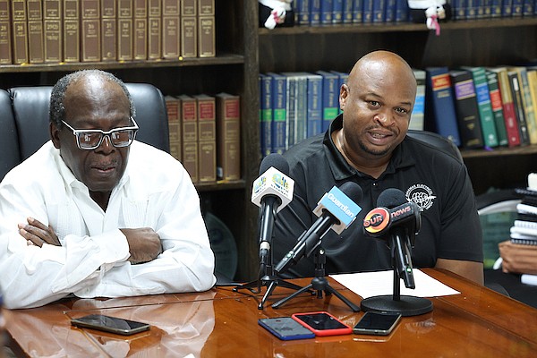 Bahamas Electrical Workers Union president Kyle Wilson flanked by Obie Ferguson KC and other union officials, speaks during a press conference at Mr Ferguson’s office on July 24, 2024. Photo: Dante Carrer/Tribune Staff