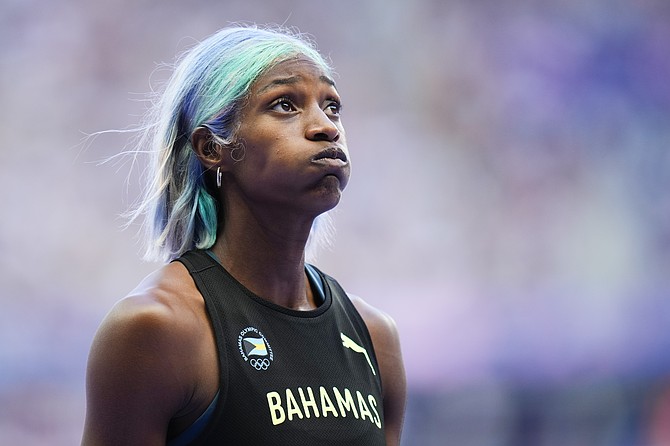 SHAUNAE Miller-Uibo prepares for her 400-metres heat at the Summer Olympics, August 5, 2024, in Saint-Denis, France. (AP Photo/Petr David Josek)