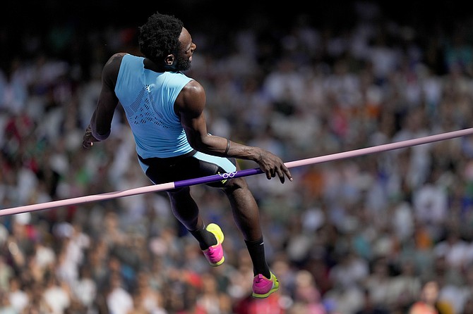 DONALD THOMAS, of The Bahamas, competes during the men’s high jump qualification round at the 2024 Summer Olympics, yesterday in Saint-Denis, France. (AP Photo/Bernat Armangue)