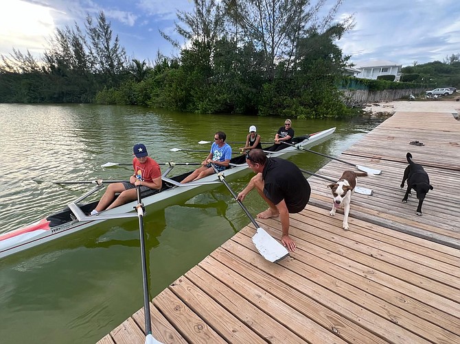 Crew and Sculler with their boat club friends.