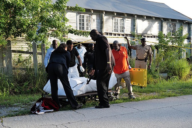 The scene on South Ocean Road where the body of a man was found in adjacent waters yesterday. Photos: Dante Carrer/Tribune Staff