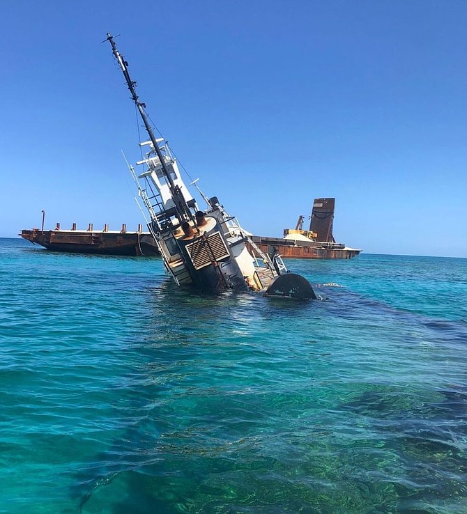 The two vessels pictured have been stranded in a protected marine area in Abaco since March 2024.