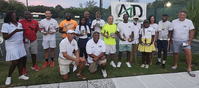 FINALISTS of the 30th annual AID Clay Court Championships pose with their awards. The event wrapped up on Saturday at the Gym Tennis Club in Winton Meadows.