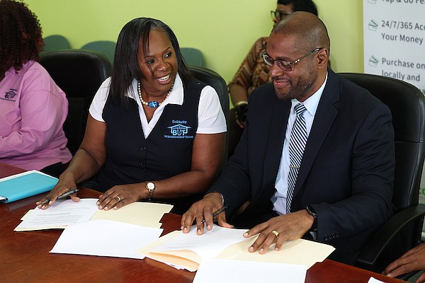 Bahamas Union of Teachers (BUT) President Belinda Wilson and Teachers and Salaried Workers Co-Operative Credit Union Ltd (TSWCCUL) General Manager Byron Miller during a press conference where The BUT and TSWCCUL signed an agreement to assist BUT members with financing on August 20, 2024. Photo: Dante Carrer/Tribune Staff