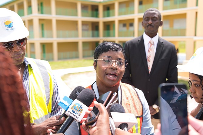 Minister JoBeth Coleby-Davis speaks with reporters while touring the solar panel project at C H Reeves High School on August 22, 2024. Photo: Chappell Whyms Jr