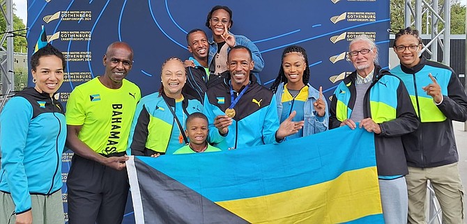 Olympian Timothy Munnings added the gold in the 400 metres on Saturday to the bronze he captured in the 200m. Here, he is flanked by his support team at the 2024 World Masters Track and Field Championships in Gothenburg, Sweden.