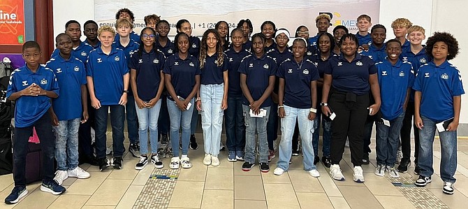 MEMBERS of the boys and girls national soccer teams pose together.