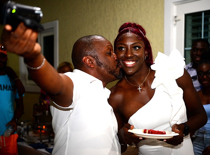 OLYMPIAN Charisma Taylor with her father Dewey Taylor. Photo Kermit Taylor/Bahamas Athletics