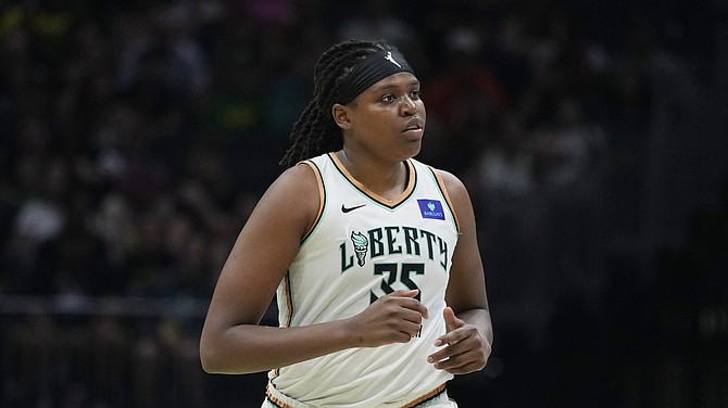 New York Liberty forward Jonquel Jones (35) in action against the Seattle Storm during the second half of a WNBA basketball game Friday, Aug. 30, 2024, in Seattle. The Liberty won 98-85. (AP Photo/Lindsey Wasson)