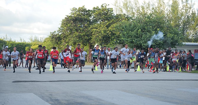 Top high school athletes and distance runners display their skills in the inaugural Red-Line Athletics’ Cross Country Championships at the St Augustine’s College campus on Saturday. Photos: Nikia Charlton